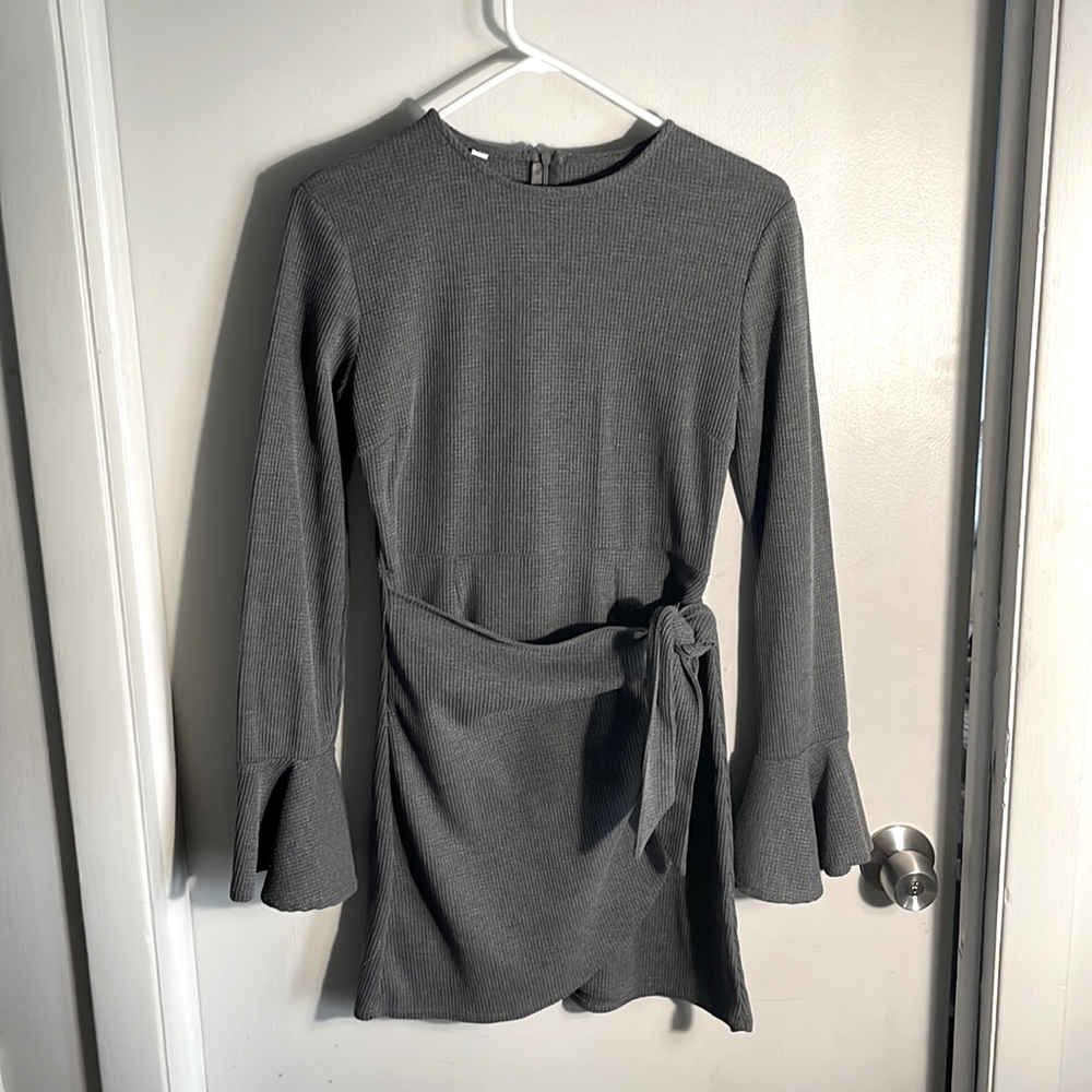 Cute mini sweater dress! Size large but runs smaller.